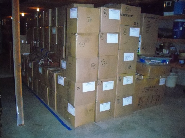 Our boxes, packed and stacked in Sara's father's basement--Lexington, Kentucky--