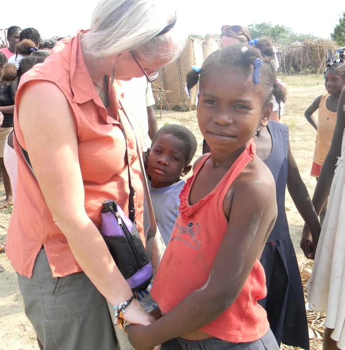 Kathy with Haitian children, March 2010--