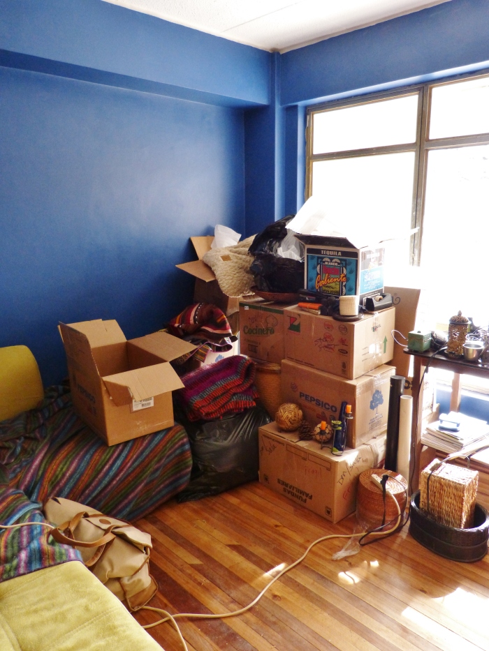 Boxes piled high in Sara's new office--